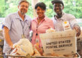 In Glenridge, GA, Letter Carrier David Drawdy, Customer Services Supervisor Tamla Shaw and Letter Carrier Willie Ramsey gather donations.
