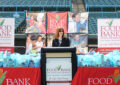 South Jersey Sr. Post Office Operations Manager Ronelle Mihok speaks at a food drive kickoff at Campbell's Field in Camden, NJ.