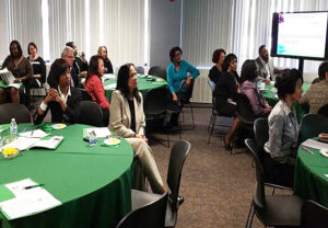Participants listen to presentations at Network’s recent open house in Washington, DC.
