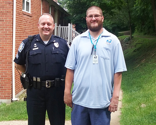 Sgt. Matthew Grubb of the Ross Township, PA, Police Department and Ingomar, PA, City Carrier Assistant Sean Matulevic