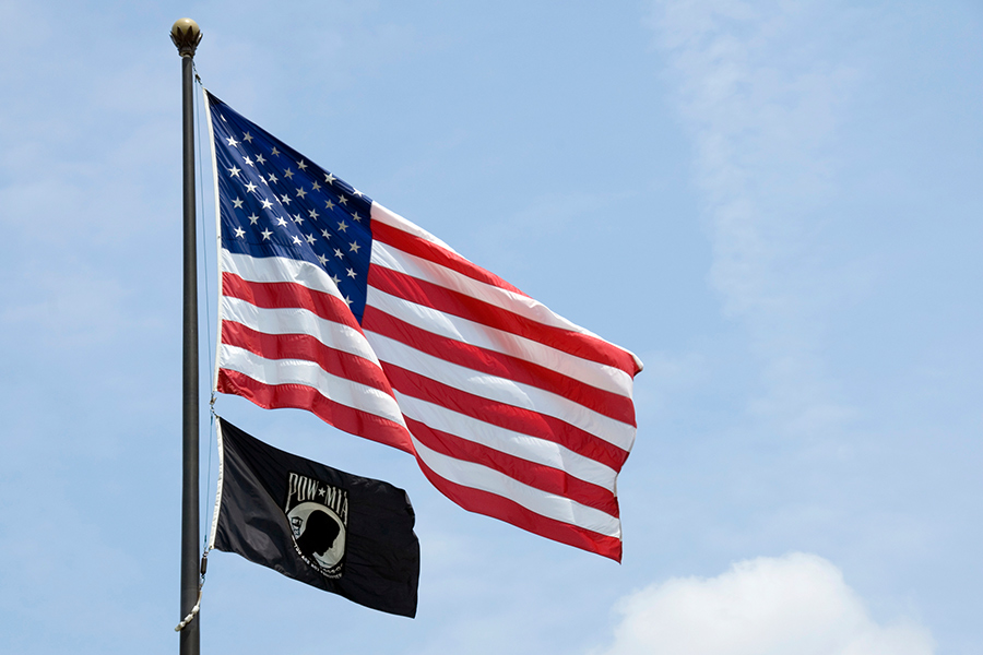 The U.S. Flag and the POW-MIA flag.
