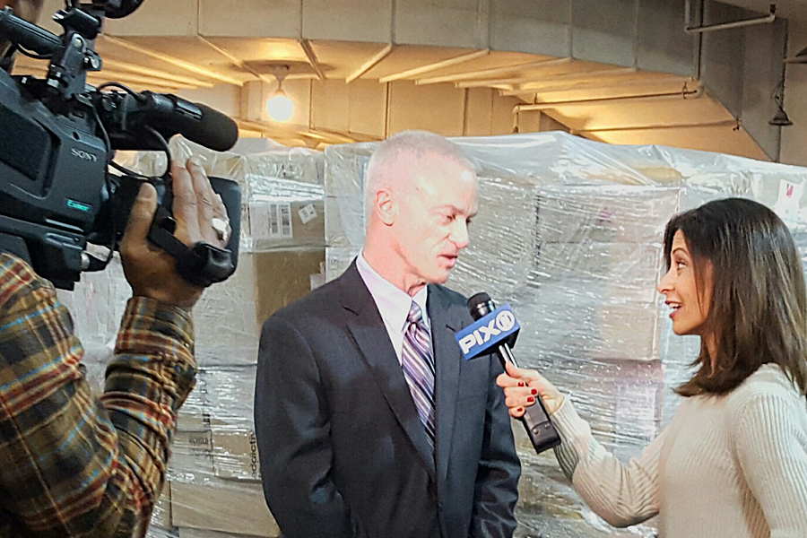 Consumer Advocate John Budzysnki is interviewed by WPIX-TV reporter Lisa Mateo in New York City Dec. 21.