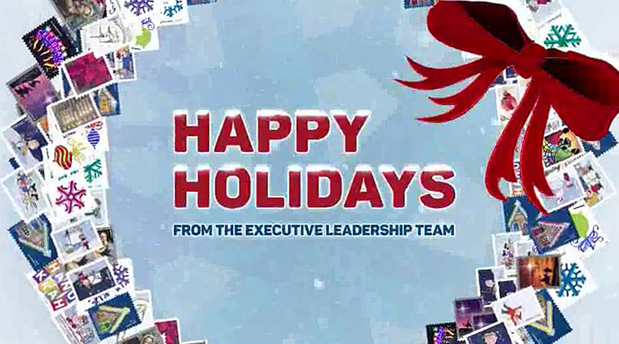 Postage stamps, a red bow and the words "Happy Holidays From The Executive Leadership Team