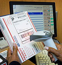 An employee scanning a package.