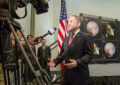 Alan Stern, principal investigator of the New Horizons mission, speaks to reporters at the dedication ceremony.