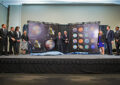 Postal Service leaders, NASA officials and others unveil the stamps.