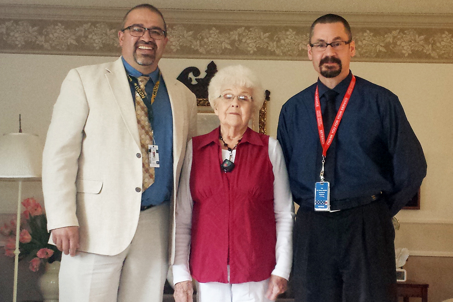 Dakotas District Sr. Plant Manager Marty Chavez and District Manager Doug Stephens pose with Marilyn Rice after delivering the letter.
