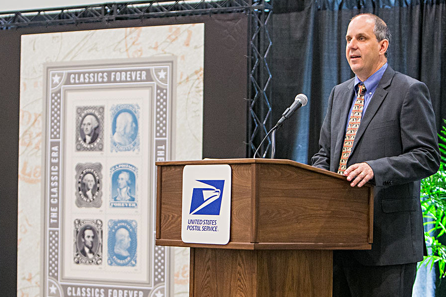 New Products and Innovation VP Gary Reblin dedicates the Classics Forever stamps June 1 at the World Stamp Show.