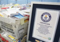 DAR’s Guinness World Records certificate is displayed next to letters that await mailing.