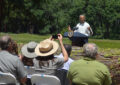 President Obama addresses an audience inside the park.