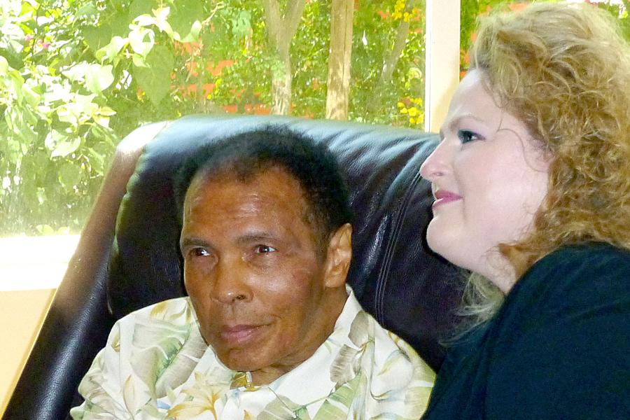 Muhammad Ali receives a visit from pen pal Stephanie Meade in 2014.