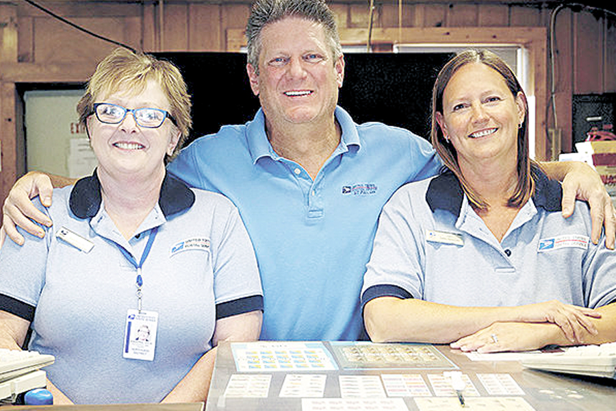 The Willernie Post Office’s three employees are, from left, Retail Associate Jaci Tennyson, Postmaster Steve Boughan and Retail Associate Julie Knoepke. Image: White Bear Press