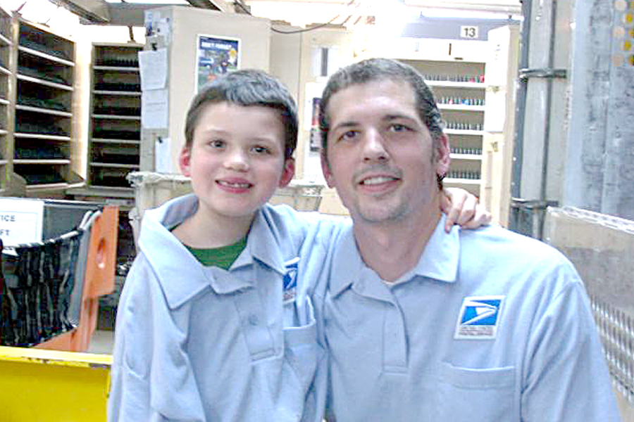 Maple Valley, WA, Retail Associate Jason Queirolo with his son, Gavin