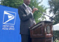 Deputy Postmaster General Ronald Stroman speaks at the Oct. 1 Kwanzaa stamp dedication ceremony.