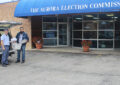 Aurora, IL, Letter Carrier Devin Broderick and City Carrier Assisant Javier Oropeza deliver ballots and other mail to the local election commission.
