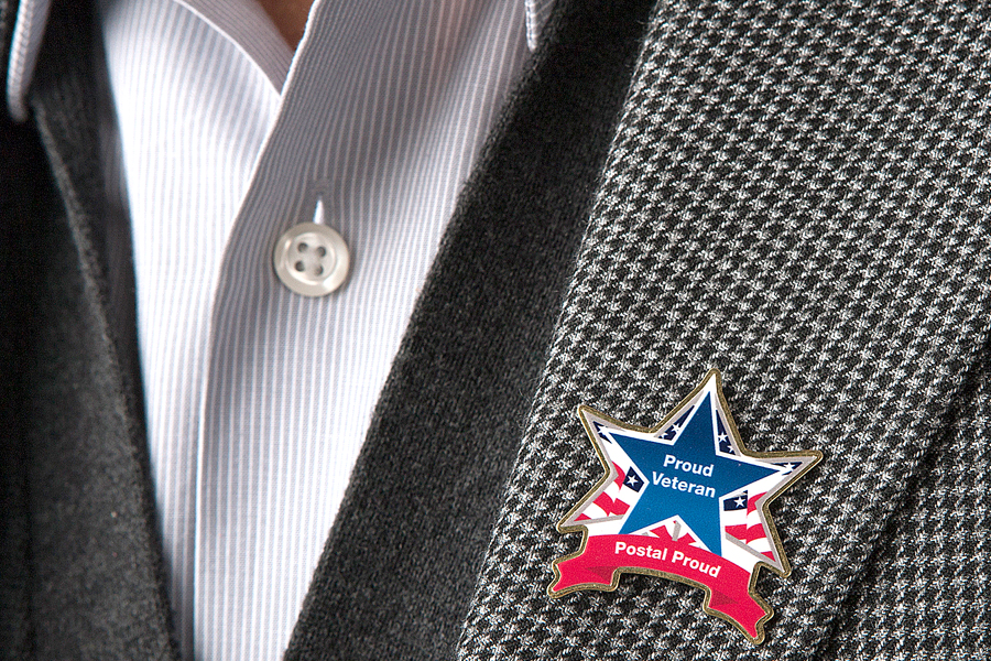 USPS is distributing lapel pins to employees who served in the armed forces.