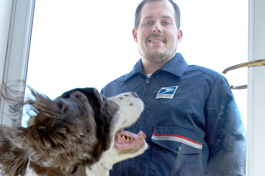 USPS is reminding employees to take precautions to avoid dog attacks during the holidays.