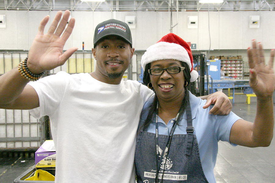Los Angeles Processing and Distribution Center custodians Devin Toliver and Diana Babbit bid farewell to another busy year.