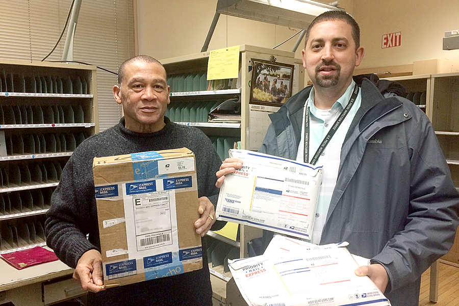 Midland, PA, Postmaster Theo Badgett and Postal Inspector Ian Ortega