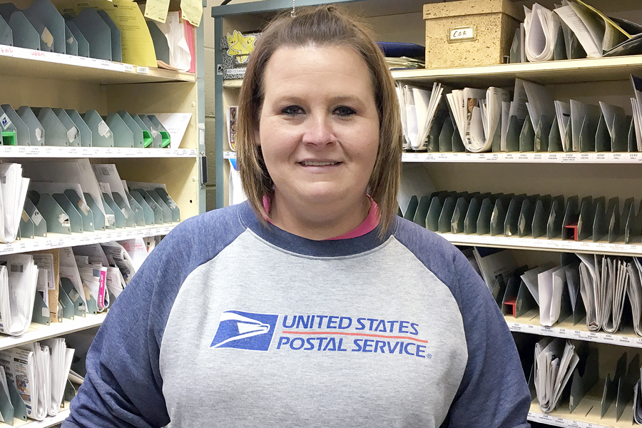 Woman with USPS logo sweatshirt