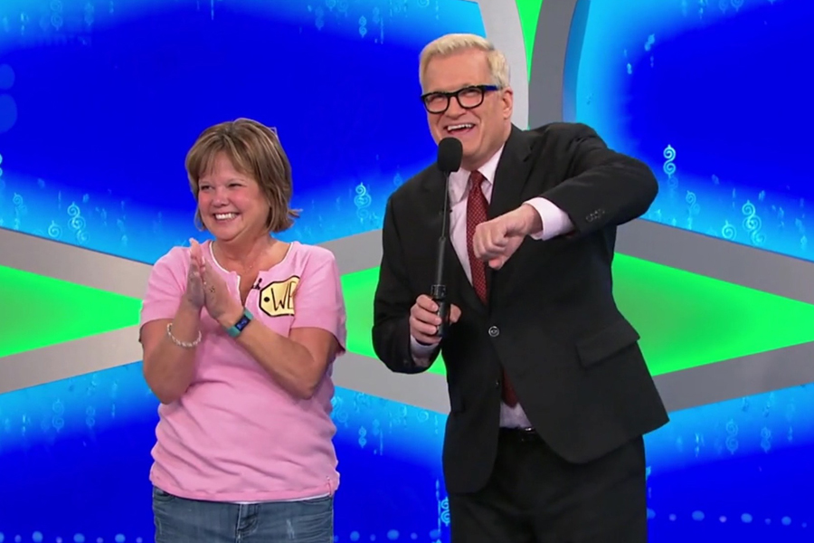 USPS employee with "Price Is Right" host Drew Carey