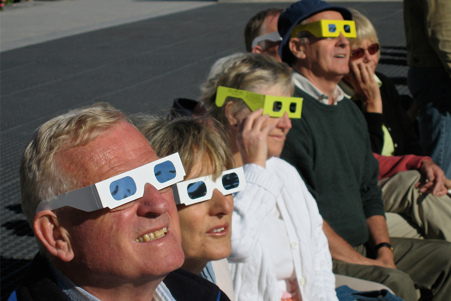 People watch a solar eclipse in Spain in 2015.