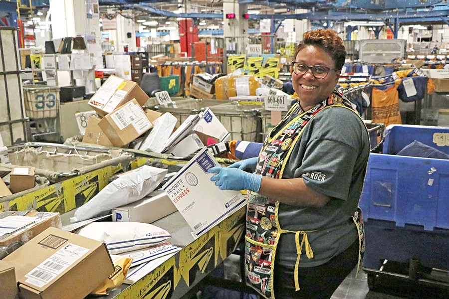 Woman sorts mail