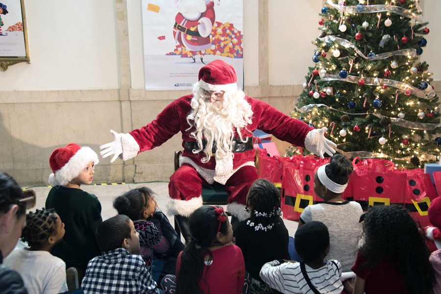 Santa Claus greets children