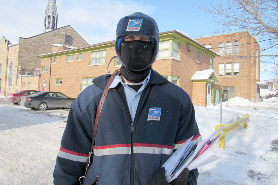 Buffalo, NY, Letter Carrier Shane Pierren dons protective winter gear