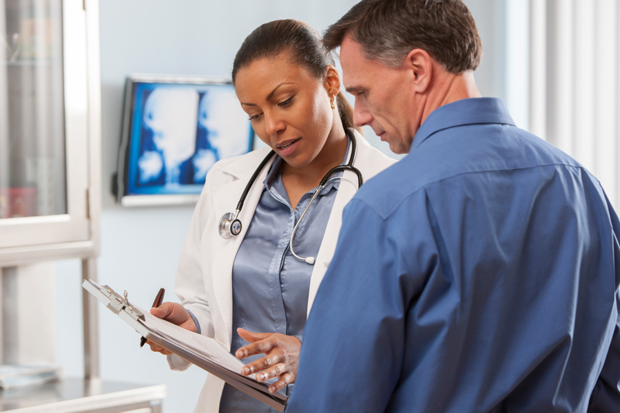 Doctor reviewing information with patient