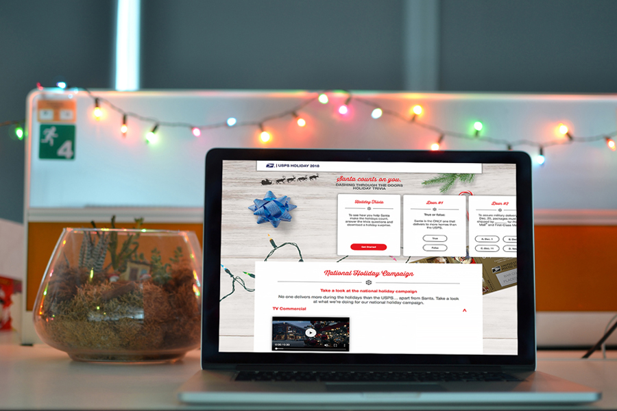 Laptop computer showing USPS Holiday 2018 website