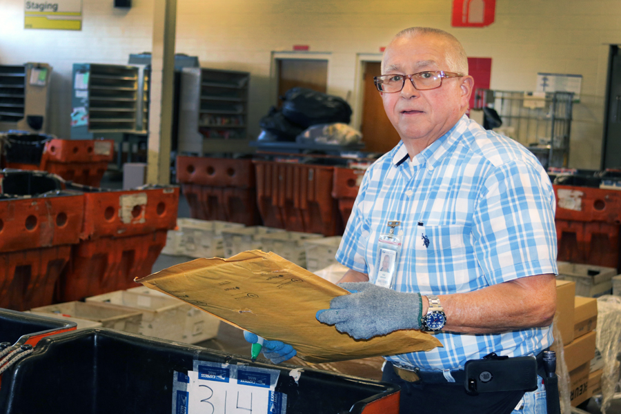 Sam Brewer, a distribution clerk at Manor Station in Winston-Salem, NC