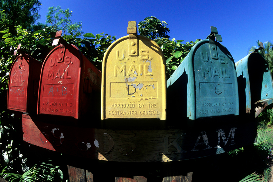 Red, yellow and blue mailboxes