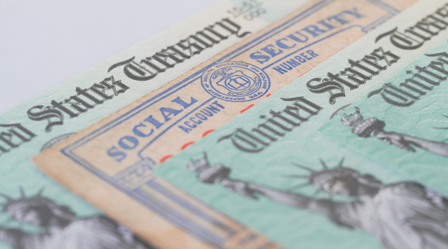 Treasury check next to Social Security card